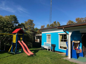Bungalow mit Garten & Spielplatz